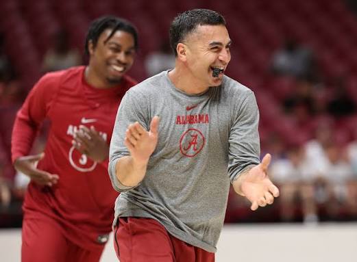 Henry Barrera coaching on a basketball court