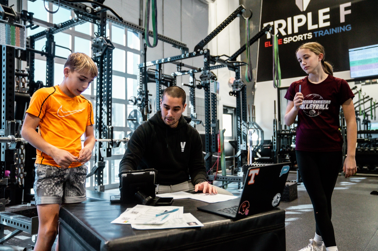 Rich Burnett coaching a group of athletes during a training session